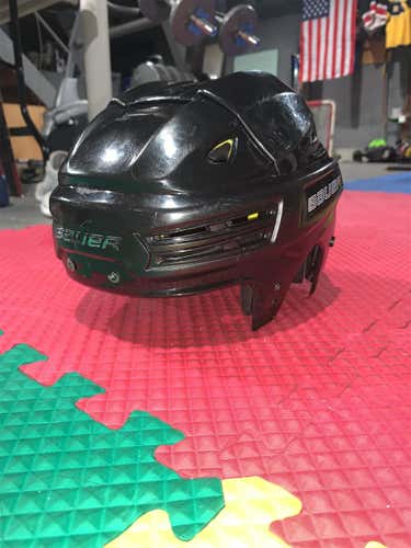 One season used Medium Bauer Re-Akt 200 Helmet