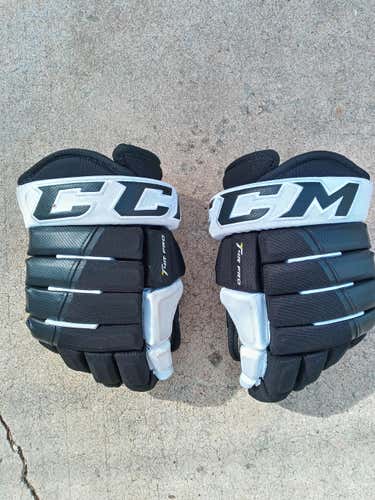Used CCM Tacks 4 Roll Pro Gloves 13"