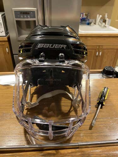 Used Large Bauer Re-Akt 100 Helmet