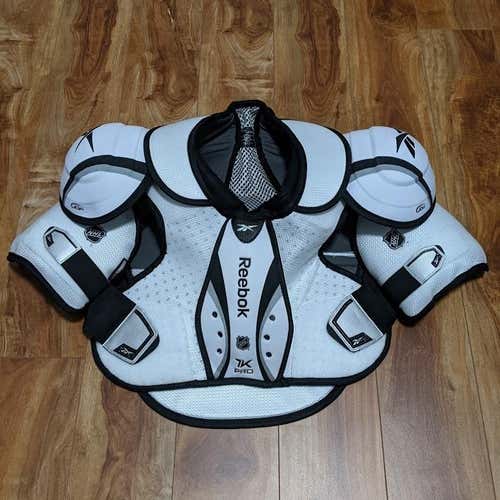 NEW! REEBOK 7K Shoulder Pads - Size M/L