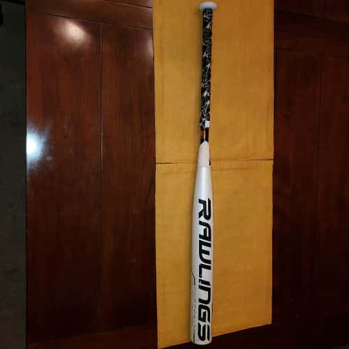 2019 Rawlings Quatro Bat (-9) 25 oz 34" with lizard grip.