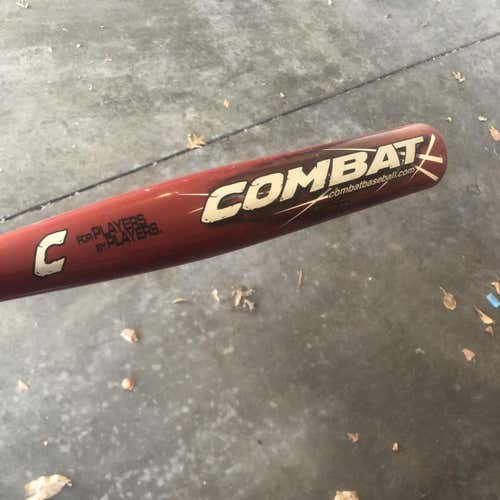 Used Combat 52 Caliber (-3) 30 oz 33" Bat