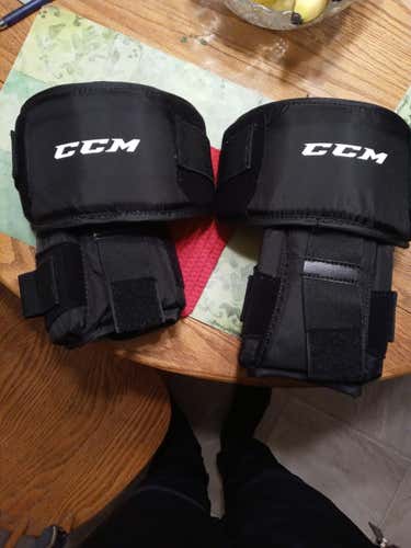 New CCM Knee Protectors-Senior