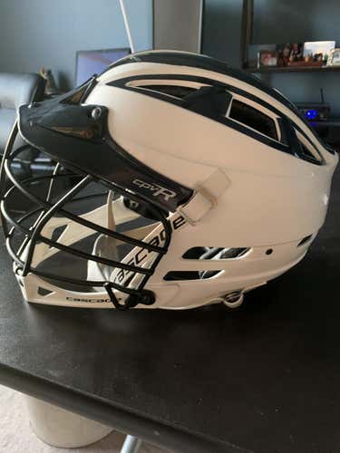White Used Youth XS Player's Cascade CPV-R Helmet Custom Navy Blue Stickers