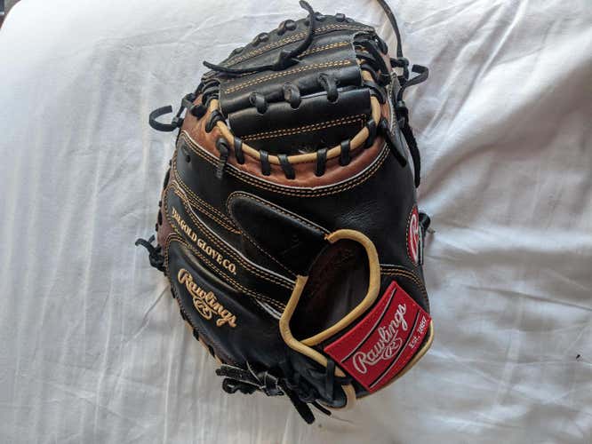 Used Kid Pitch (9YO-13YO) Rawlings Right Hand Throw Heart of the hide Catcher's Glove 33"