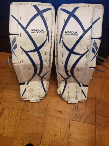 White Used Senior 34"+1 Reebok Revoke Goalie Leg Pads