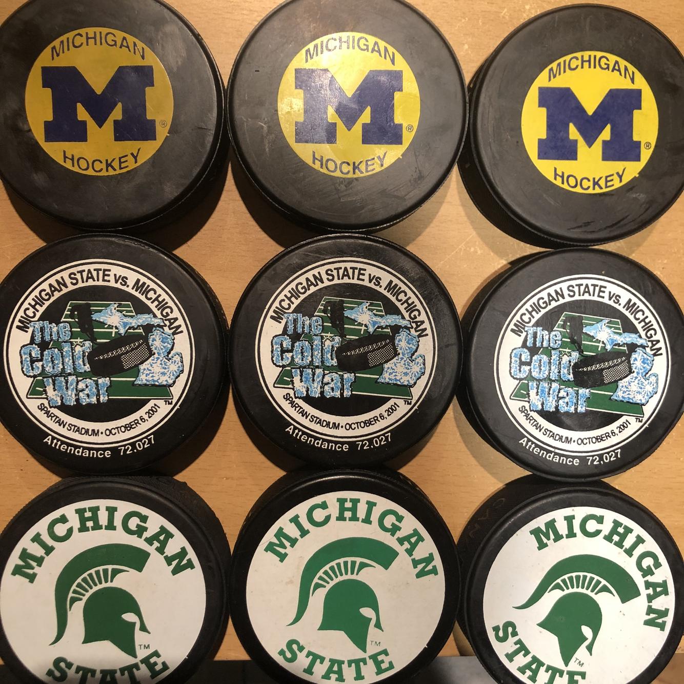 Michigan & Michigan State NCAA Hockey Pucks SidelineSwap
