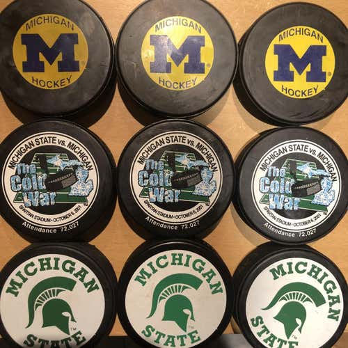 Michigan & Michigan State NCAA Hockey Pucks