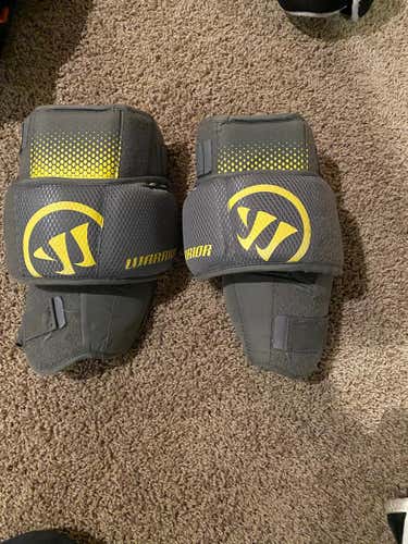 Used Warrior goalie knee pads
