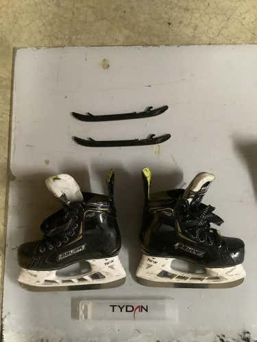 Used Junior Bauer Supreme Ignite Pro + Hockey Skates Regular Width Size 1