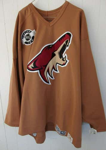 Phoenix Coyotes unused copper CCM Center Ice practice jersey (size 56 w/tag on sleeve) from 2003-06