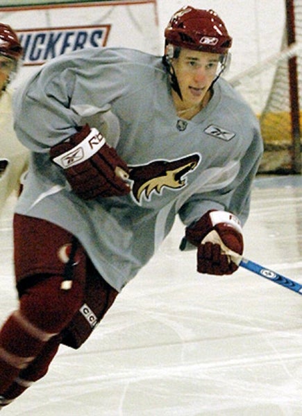 Phoenix Coyotes unused gray old-logo Reebok practice jersey w white gussets (size 56 sewn on tail)