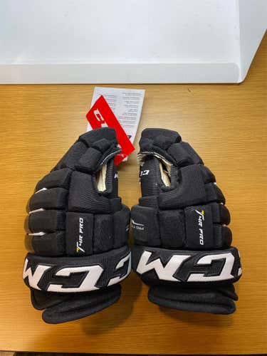 Black Junior CCM Tacks 4 Roll Pro 12"  Gloves