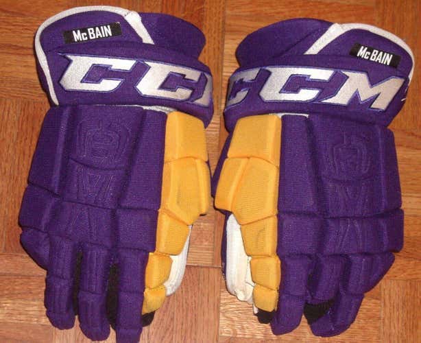 (LA KINGS) Jamie McBain game-worn purple+gold throwback CCM Pro gloves (name on cuffs) 2014-2015