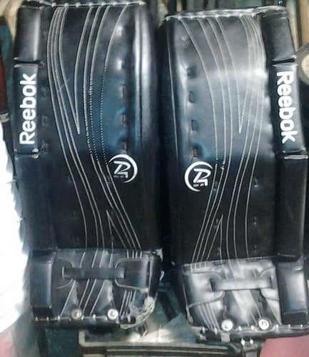 Black Used Junior 24" Reebok Premier 4 14K Goalie Leg Pads