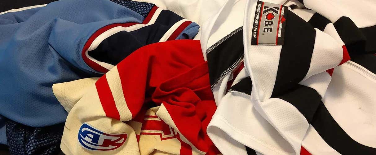 Two Random Brand New Throwback Authentic Nike Jerseys. (1 NFL ,1 NBA).