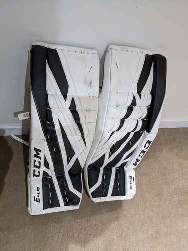 White Used Intermediate 30" CCM Extreme flex 4.9 Goalie Leg Pads