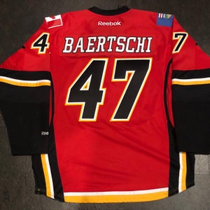 Reebok Premier Calgary Flames BAERTSCHI Home Jersey LARGE