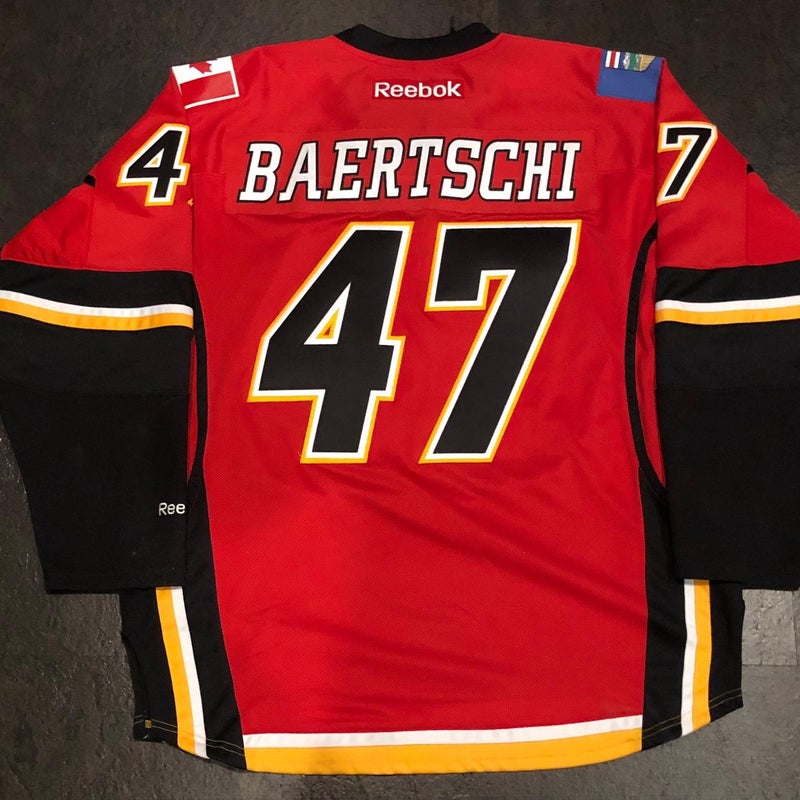 Reebok Premier Calgary Flames BAERTSCHI Home Jersey LARGE