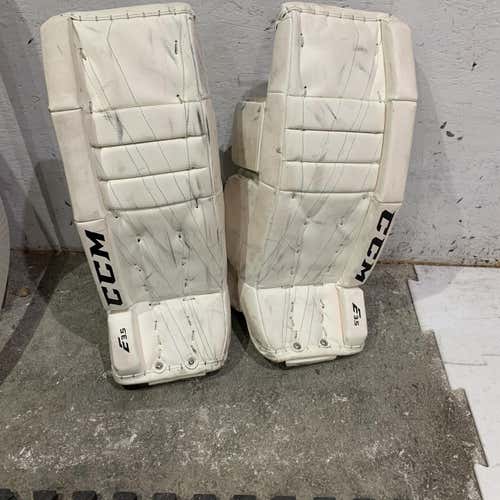 White Junior 24" CCM Extreme Flex E3.5 Goalie Leg Pads