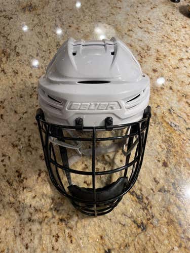 White Used Medium Bauer Re-Akt 100  Helmet