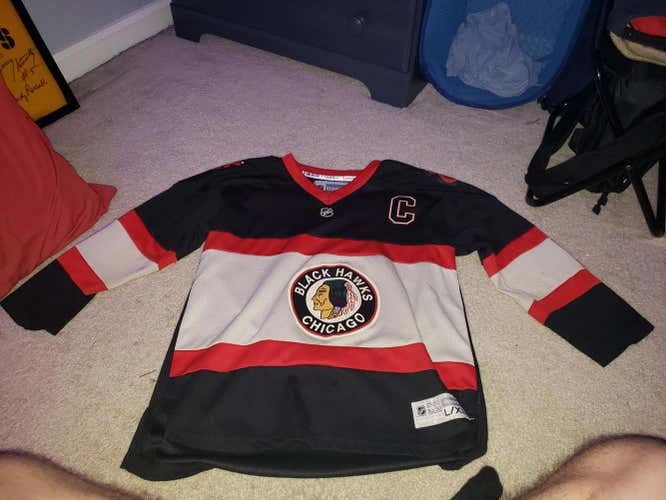 Jothan Toews Youth L/XL Reebok Jersey