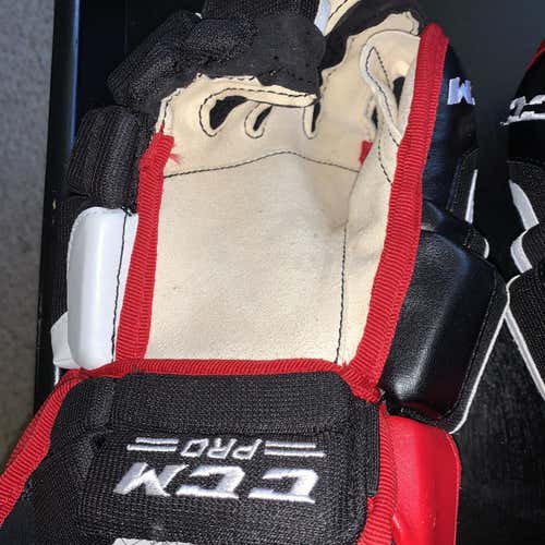 Black Senior CCM U+ CL 13" Pro Stock Gloves