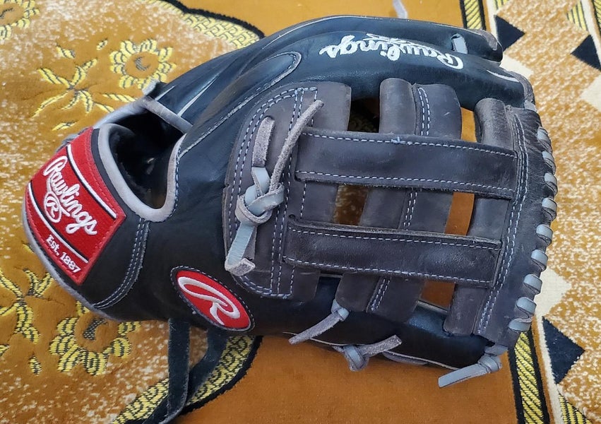 Black Used Adult Rawlings Right Hand Throw Infield Heart of the Hide Baseball Glove 11.75"