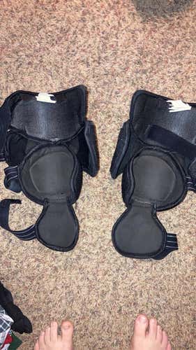 Used CCM Int Knee Guards