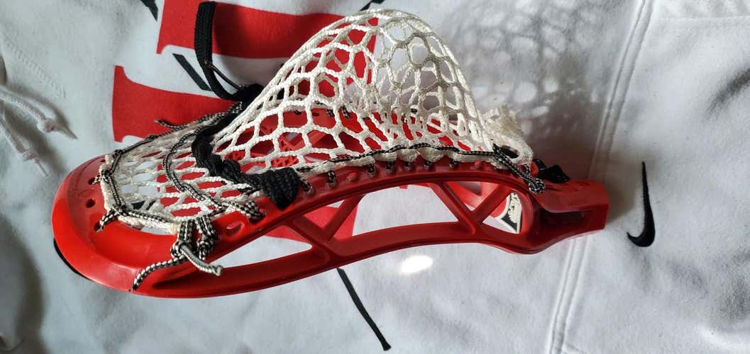 New red Brine Triumph X Head, strung