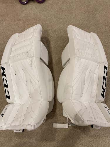 White Used Junior 26" CCM Extreme Flex E4.5 Goalie Leg Pads