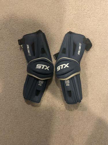Used Large Navy STX Stallion HD Arm Guards In Great Condition