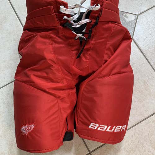 Red Senior Large + 1”Bauer Red Wings Player: Quincy. Pro Stock Hockey Pants