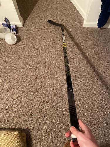 Senior Left Hand Supreme 2S Pro Mid Pattern Pro Stock Hockey Stick