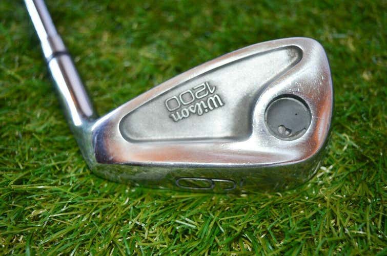 Wilson 	1200	9 Iron	 Right Handed	36.25"	Steel 	Stiff	New Grip