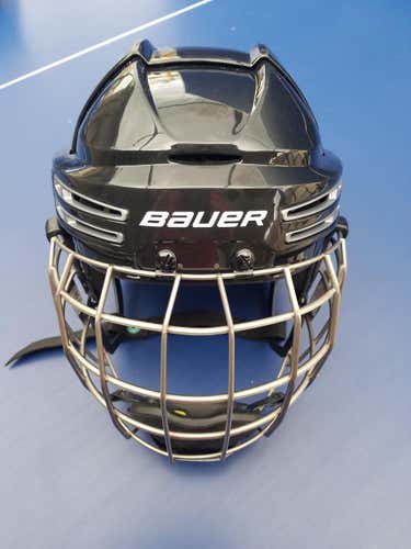 Nearly New Black Used Medium Bauer Re-Akt 75 Helmet with Titanium Cage