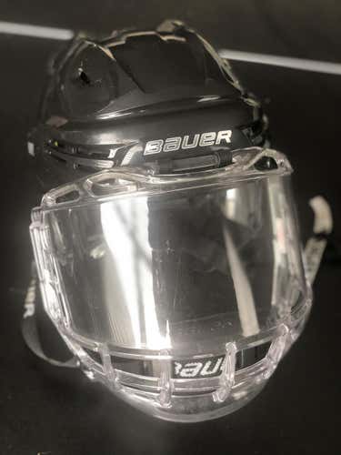 Black Used Small Bauer Re-Akt Helmet with clear face shield