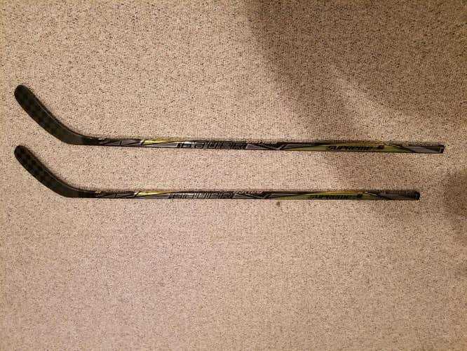 Two (2) Bauer Supreme 1S Hockey Sticks Junior Left 52 Flex