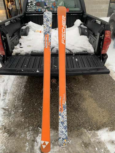 Used Men's Fischer All Mountain Addict Skis With Bindings Max Din 14 and ski boots