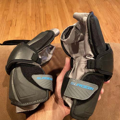 Used Medium STX Surgeon 700 Arm Guards
