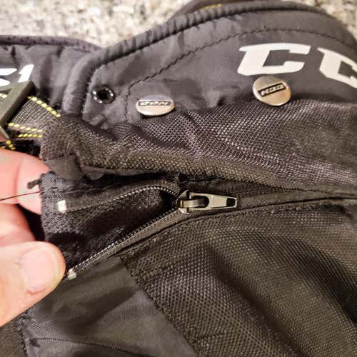 Black Used Youth Large CCM AS1 Hockey Pants