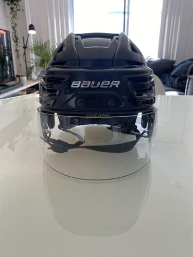 Black Used Medium Bauer Re-Akt 150  Helmet