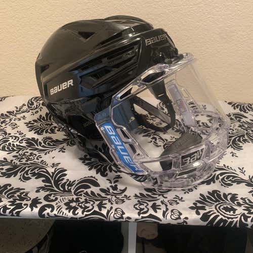 Black Used Large Bauer Re-Akt 150  Helmet