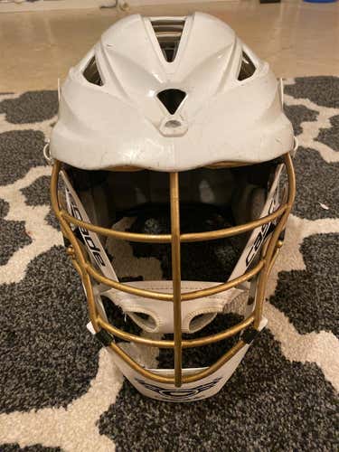White Used Cascade Pro7 Helmet Gold Facemask