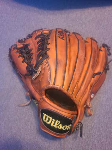 Orange Used Adult Wilson Left Hand Throw Outfield A2000 Baseball Glove 12"