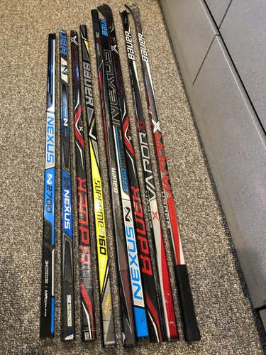 9- Pack broken Bauer stick shafts