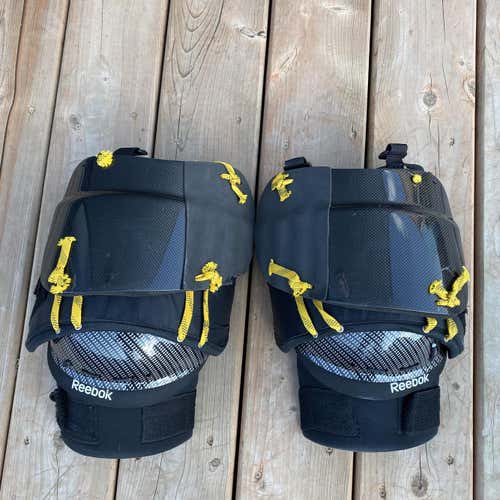 Used Reebok Swiss Knee Guards.