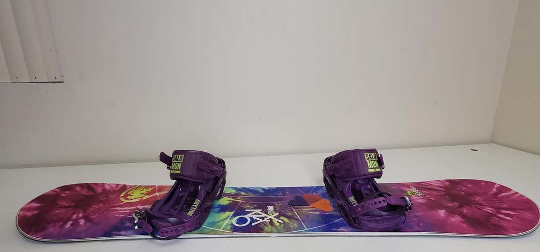 Used Women's Never Summer Onyx 130cm Snowboard Park With Small Salomon Rhythm bindings.