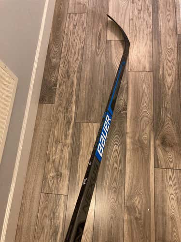 Senior Right Handed Nexus Team Toe Pattern Hockey Stick