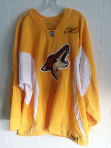 Phoenix Coyotes unused gold #71 Reebok practice jersey size 56 (everything sewn on) from 2009-2011